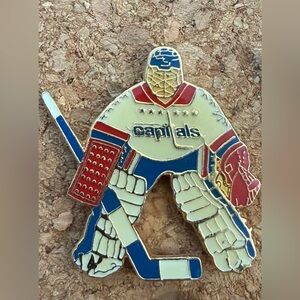 NHL Hockey Washington Capitals goalie enamel metal logo lapel pin.